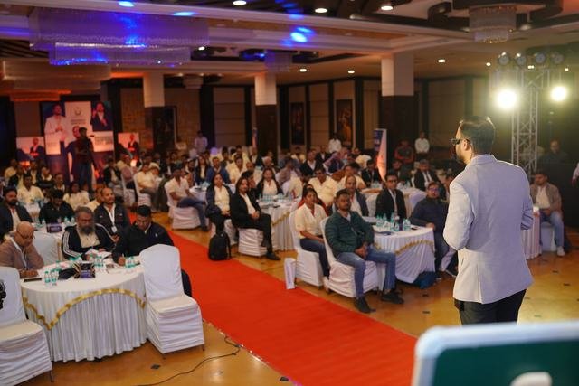 Addressing the hall